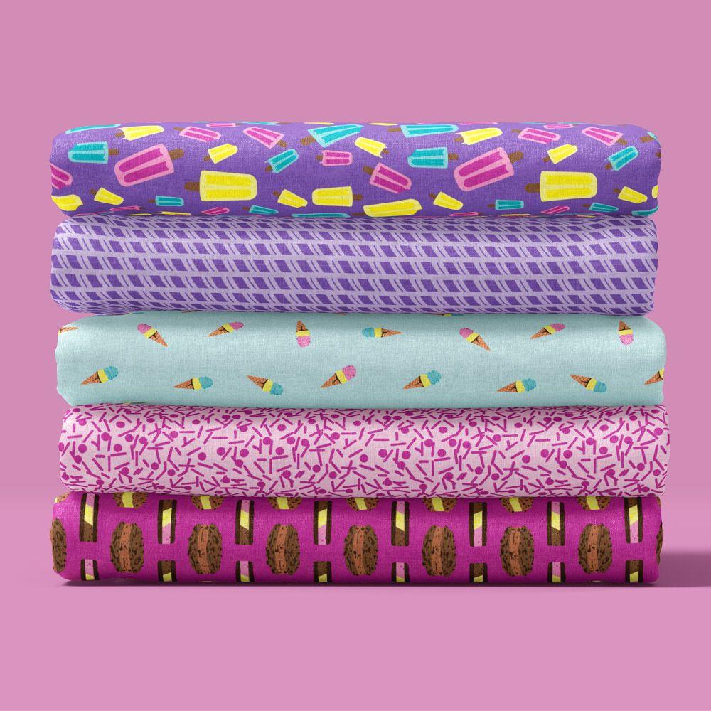 Stack of folded fabrics from the Ice Cream Shop Pattern Collection by Amy Denise